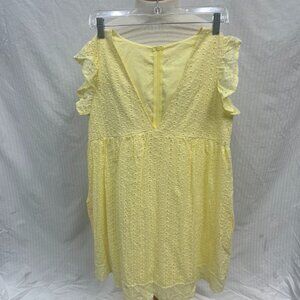 Yellow eyelet dress with sorts underneath